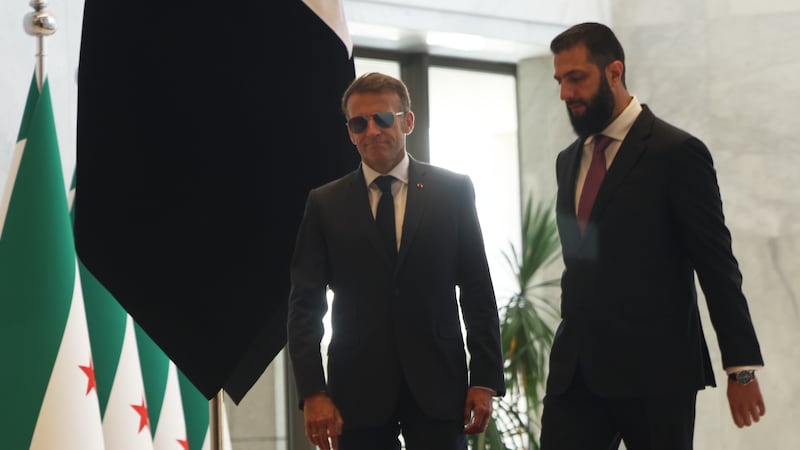 Explosions rock Damascus, wounding 18, as French President Macron visits Syria