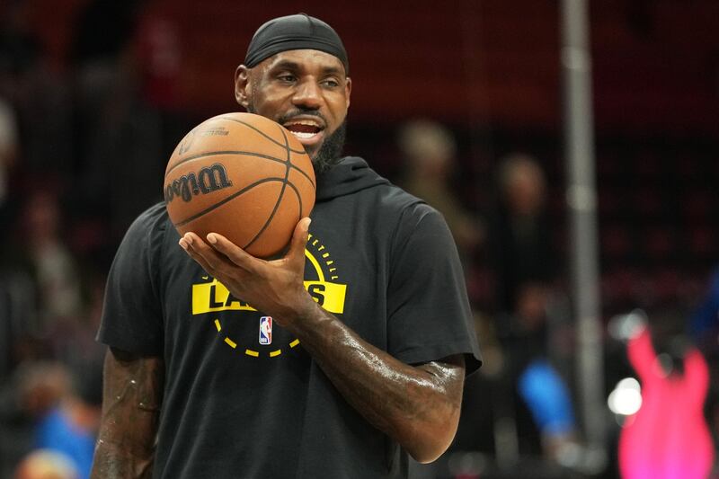 LeBron James ties NBA record for games played