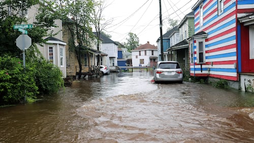 A flooded street is pictured.