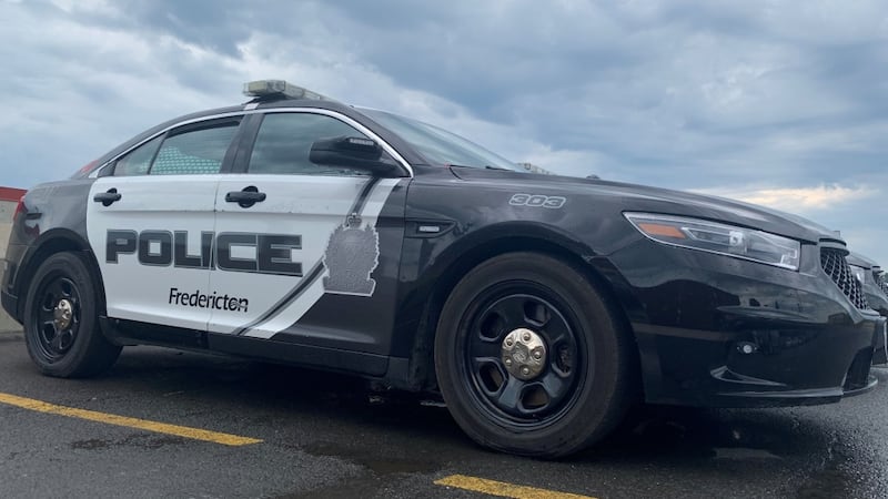 Man arrested after allegedly confining woman in vehicle, fleeing Fredericton police