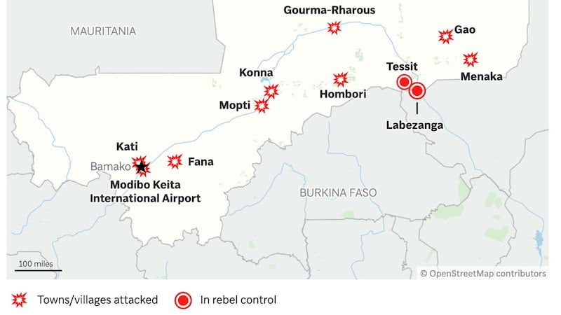 Rebels claim to capture a key military camp in northern Mali after army withdraws