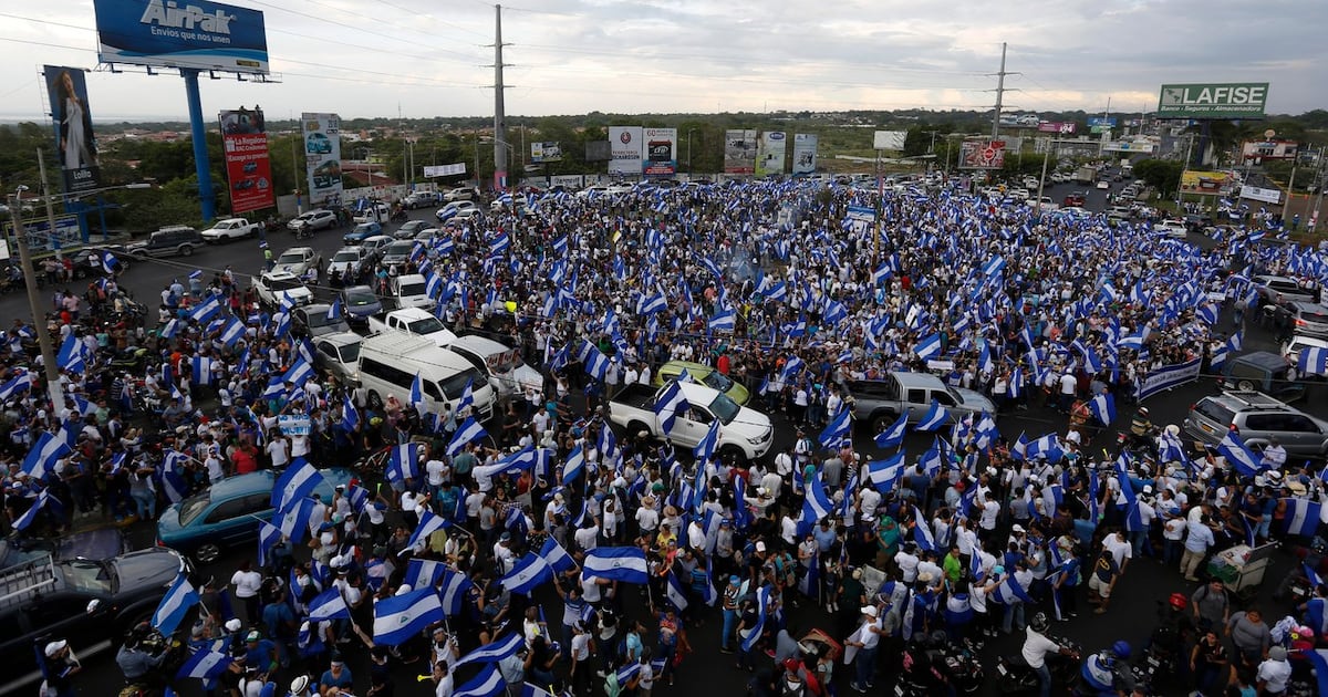 People protest at the Jean Paul Genie roundabout against the government of President Daniel Ortega, in Managua, Nicaragua, on May 15, 2018. (AP Photo/Alfredo Zuniga, File)