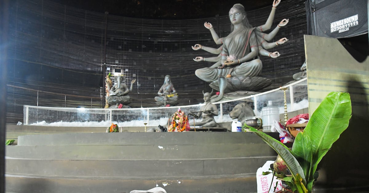 Photo: ctvnews.ca Purses and other belongings left behind by devotees lie on the floor of a worship venue for the Hindu festival of Durga Puja