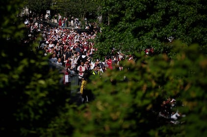 Qatar fans march