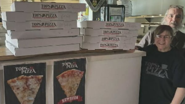 Tops In Pizza serves free pizza to hydro workers