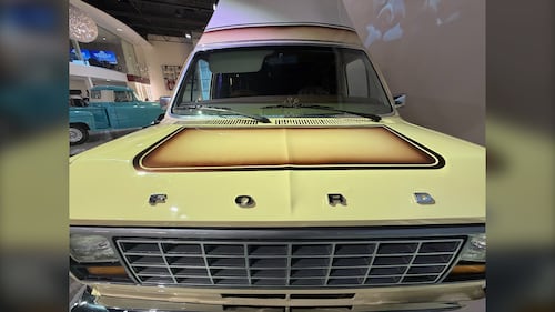 The exterior of a 1980s van is pictured.