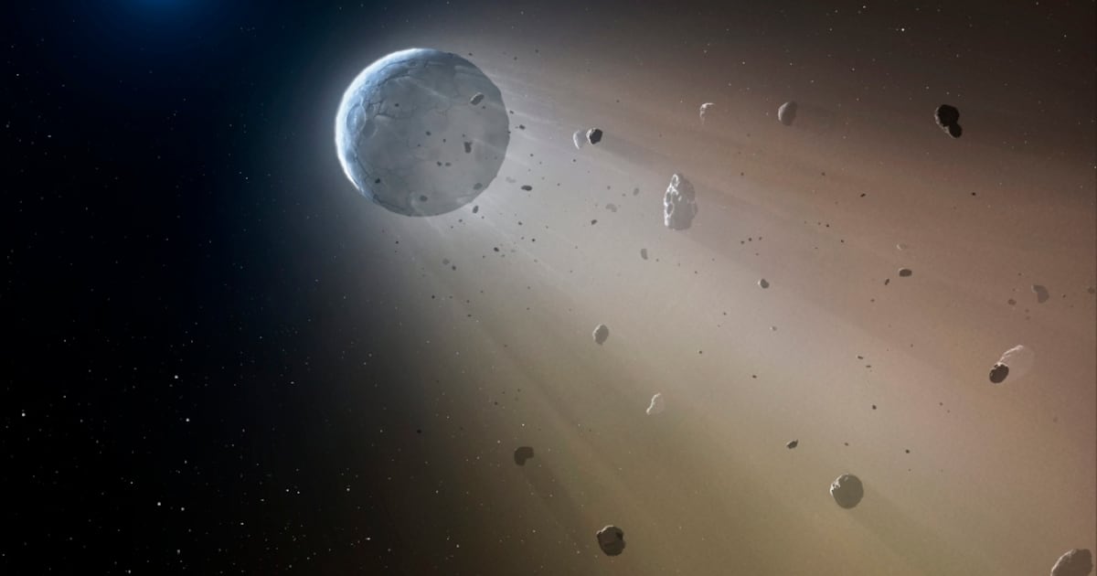 This artist's rendering provided by the Harvard-Smithsonian Center for Astrophysics shows an asteroid slowly disintegrating as it orbits a white dwarf star. (Mark A. Garlick / Harvard-Smithsonian Center for Astrophysics via AP)