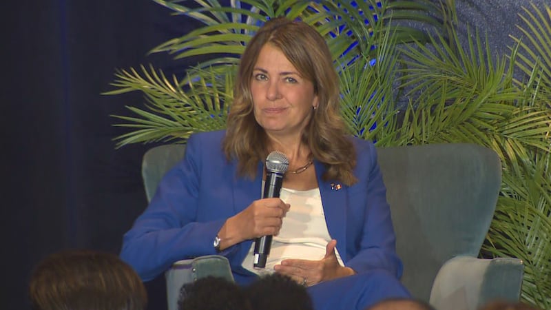 Alberta premier suggests $1,900 health premium for temporary residents