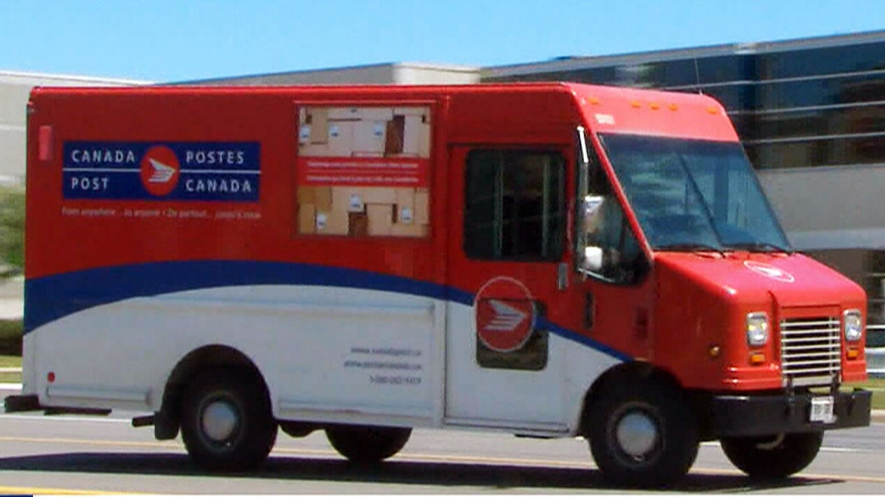 Canada Post checking mailbox heights in rural Ottawa