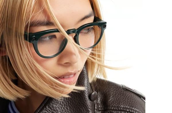 Google unveils smart glasses, taking on Meta
