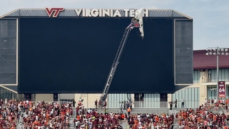 Skydiver gets rescued after crashing into scoreboard before Virginia Tech spring game