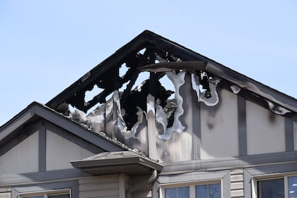 A duplex at 29 Avenue and 15 Street was damaged by fire on May 12, 2026. (Dave Mitchell/CTV News Edmonton)