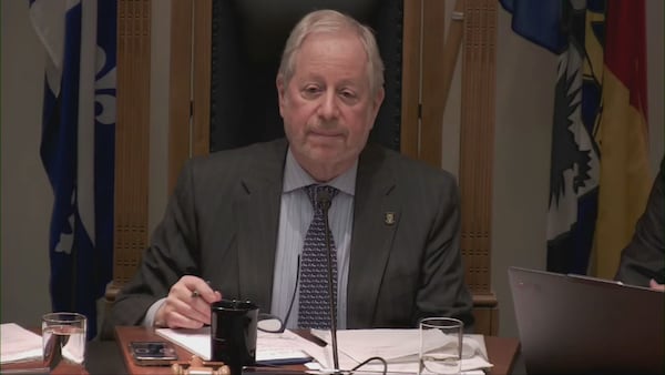 Westmount mayor apologizes after being caught on mic muttering profane insult at council meeting