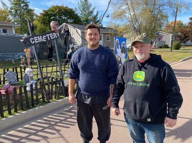 Robert and Riley-Malcolm Whittaker and seen at the Halloween Display in the Whittaker's property in West Riverview, N.B. (CTV/Derek Haggett)