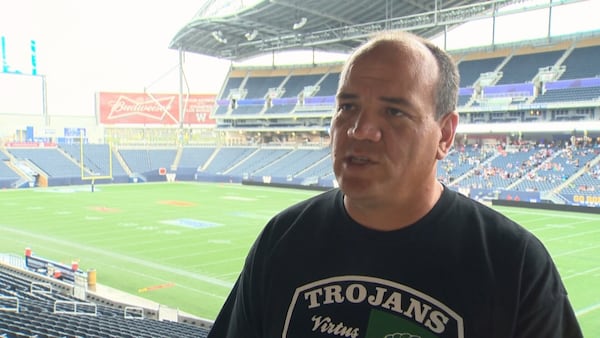 Former student sues school division over alleged sexual assault by football coach
