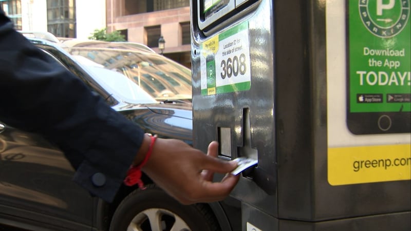 Scammers appear to be affixing fake QR codes to some parking metres, Toronto police say