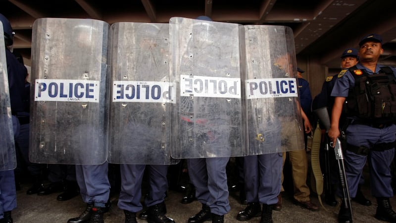At least 14 artisanal miners found dead at a disused mine in South Africa, police say