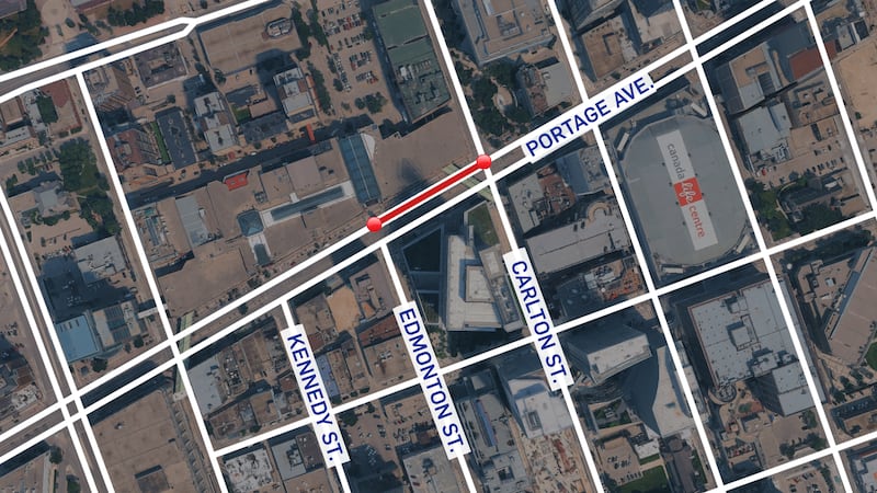 Stretch of westbound Portage Avenue in downtown reducing to one lane