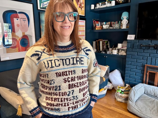 Montreal Victoire fan donning custom-knitted sweater for playoff run