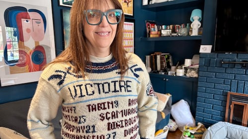 Montreal Victoire fan donning custom-knitted sweater for playoff run