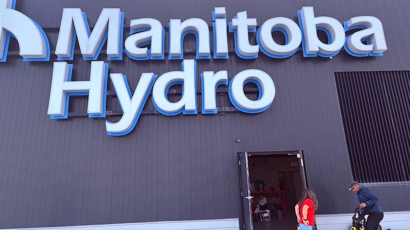 Rappelling down the Manitoba Hydro building for a good cause