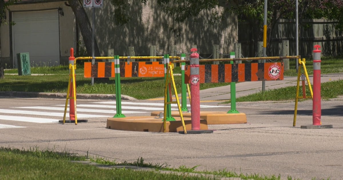 New round of temporary traffic-calming curbs popping up