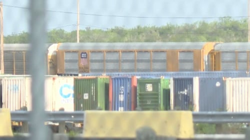 Heat stroke is suspected among 6 found dead in a shipping container at a rail yard near Texas border