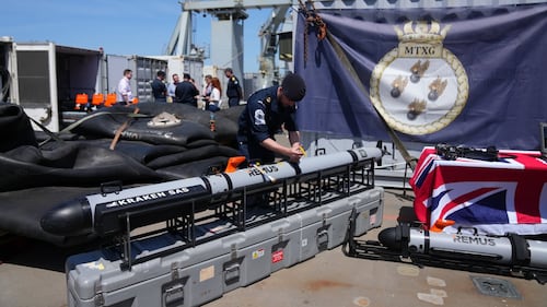 Britain's navy prepares to clear mines in the Strait of Hormuz while waiting for a peace deal