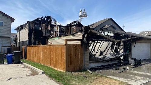 A duplex at 29 Avenue and 15 Street was damaged by fire on May 12, 2026. (Dave Mitchell/CTV News Edmonton)