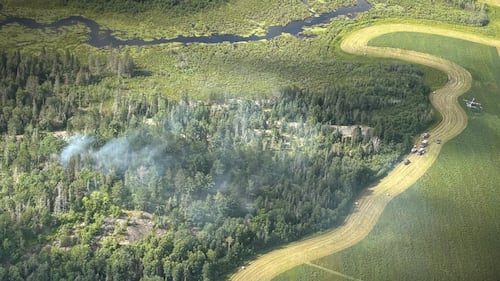 Crews battle forest fire near Chelmsford golf course