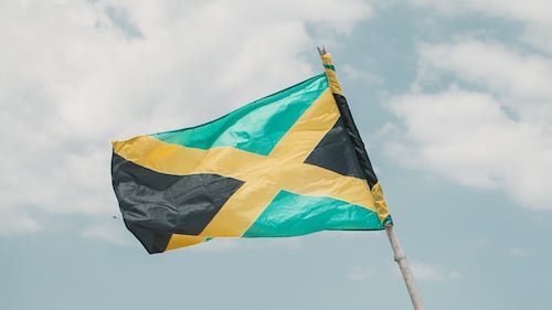 Jamaica policeman charged with murder in killing of woman that sparked protests