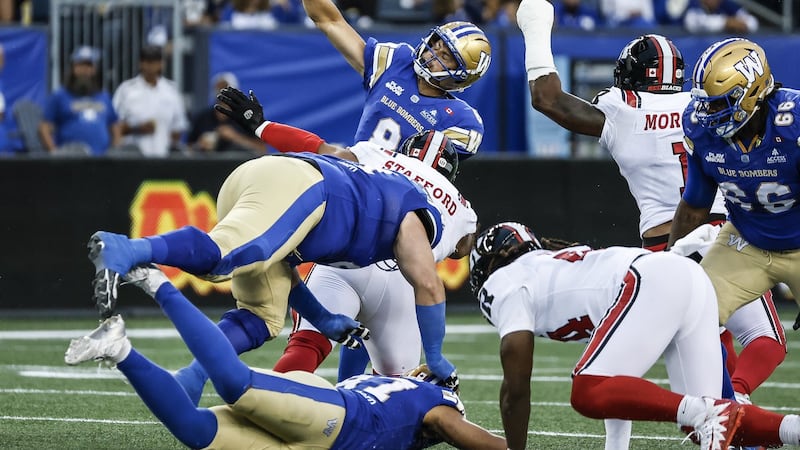 Oliveira helps Blue Bombers roll past winless Redblacks 33-21