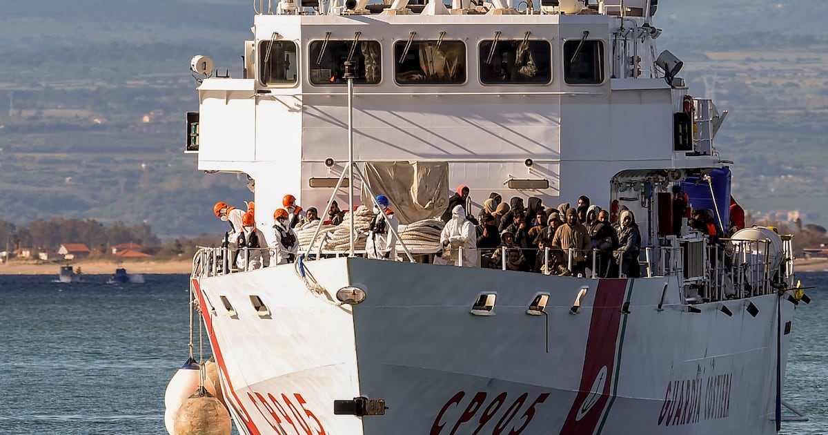 Migrant boat capsizes off Italy and leaves at least 20 people dead ...