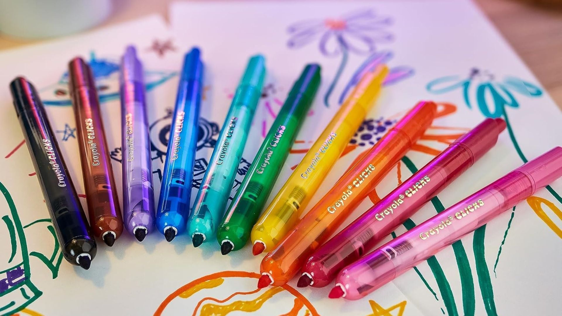 colour markers fanned out on a paper