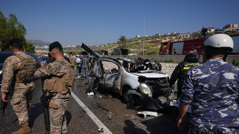 Israeli drone strikes near Beirut kill 4 and southern airstrikes kill at least 13