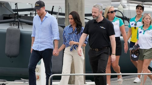 Prince Harry is back in the U.K. Are Meghan and the kids joining him?