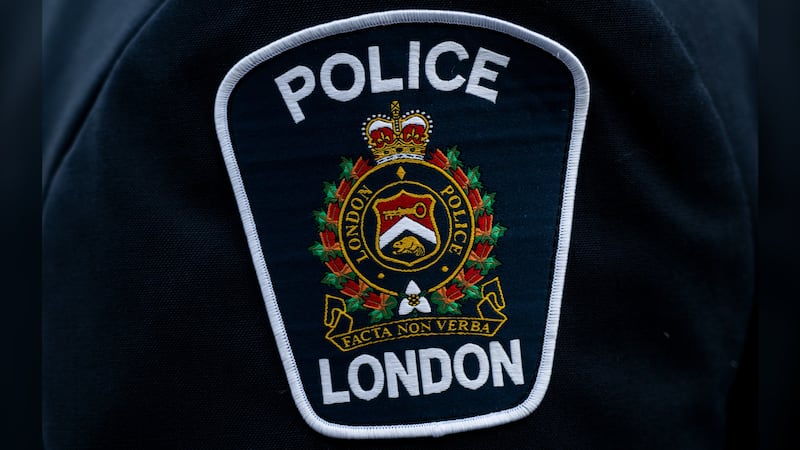 London man charged after unconscious driver found with cocaine, rifle