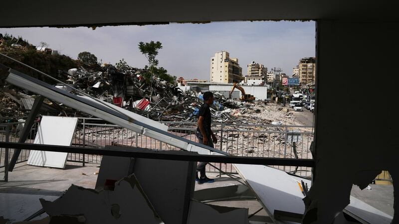 Israeli bulldozers raze about 50 Palestinian shops ahead of settlement-linked road project