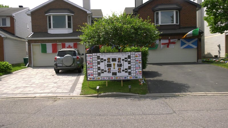 Soccer superfan turns east end street into a celebration of the sport