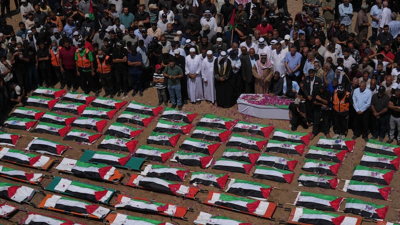 Mass funeral held in Gaza and other developments from across the Mideast