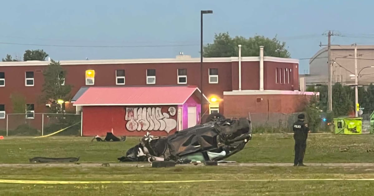 Motor vehicle crash sends one car rolling into a school yard