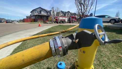 A duplex at 29 Avenue and 15 Street was damaged by fire on May 12, 2026. (Dave Mitchell/CTV News Edmonton)