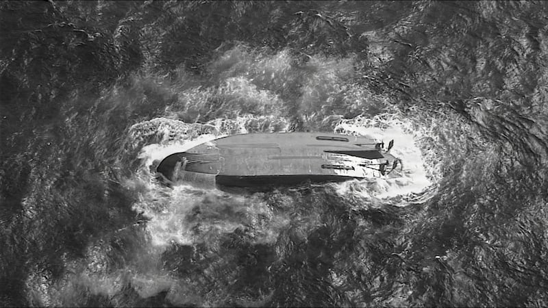 Search is on for 6 crew from a ship that overturned near the Northern Marianas during a typhoon