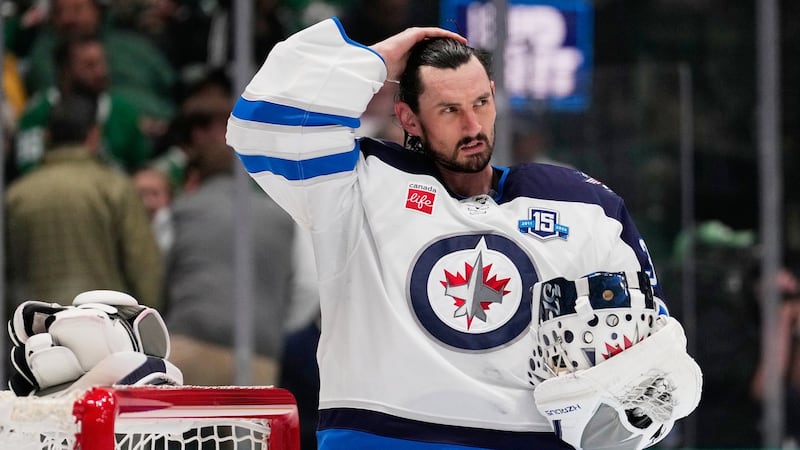 ‘A contract is a contract’: Winnipeg Jets GM addresses Connor Hellebuyck suspension