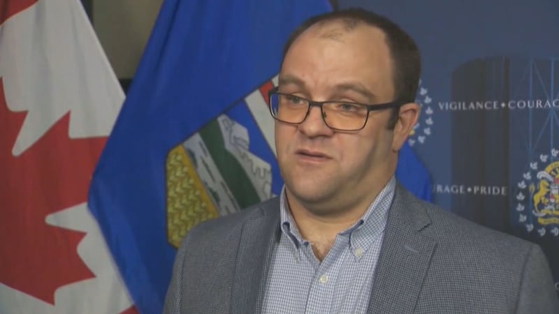 Calgary officer to stand trial for murder after two die in slow-speed police chase