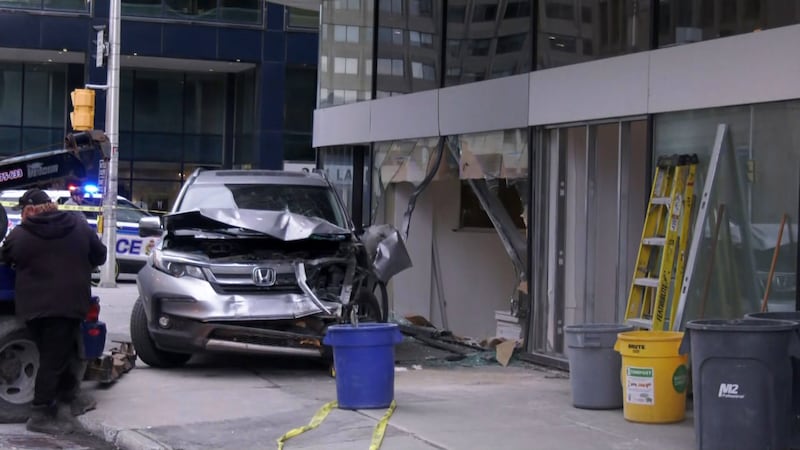 Vehicle strikes pedestrian, building in Centretown