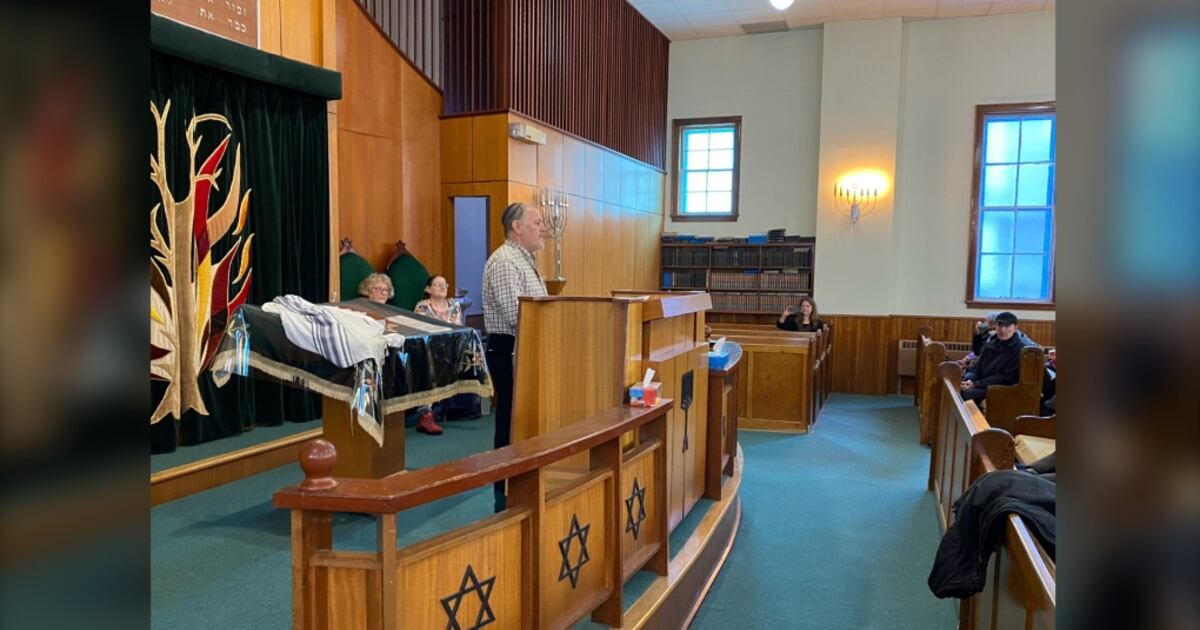 Synagogue Rally People rally outside Fredericton synagogue to show support after vandalism