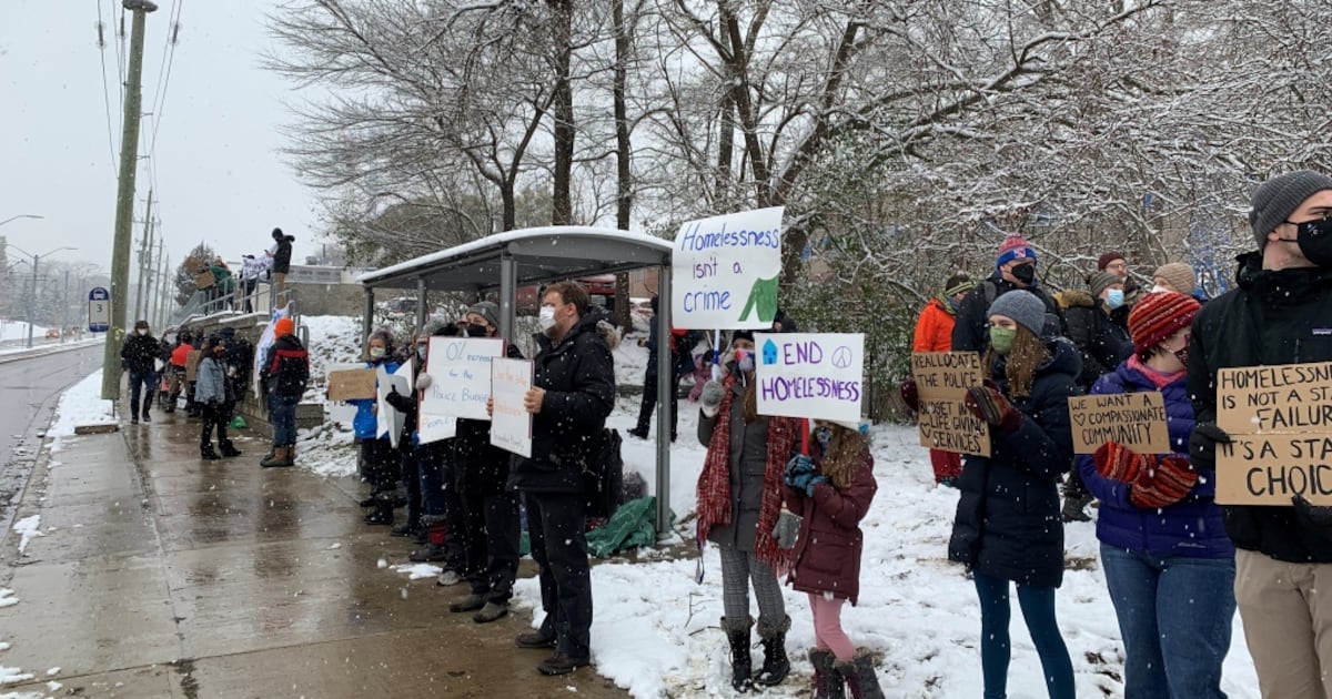 Protesters call for action and compassion after crews dismantle ...