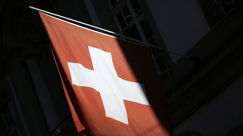 Police say a man stabbed and wounded 3 people at a Swiss train station before being arrested