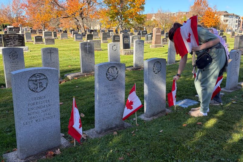 ‘Great being here’: Moncton students place flags at veterans’ graves